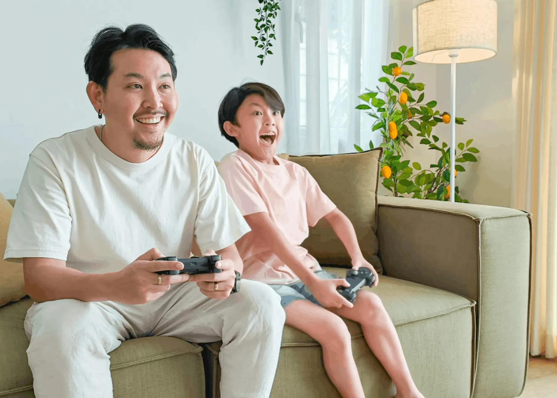 Father and son having fun while gaming